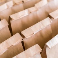 Brown paper bags on table